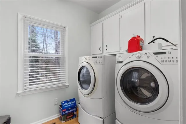 a view of a livingroom with a refrigerator