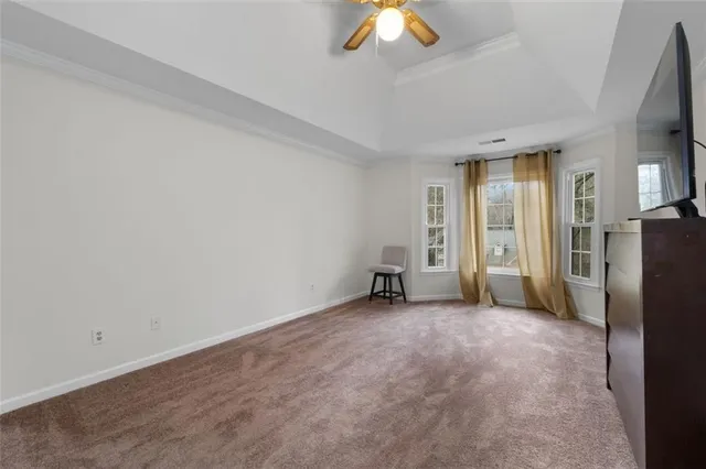 a spacious bathroom with a double vanity sink and a mirror