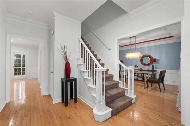 a view of a livingroom with furniture and wooden floor