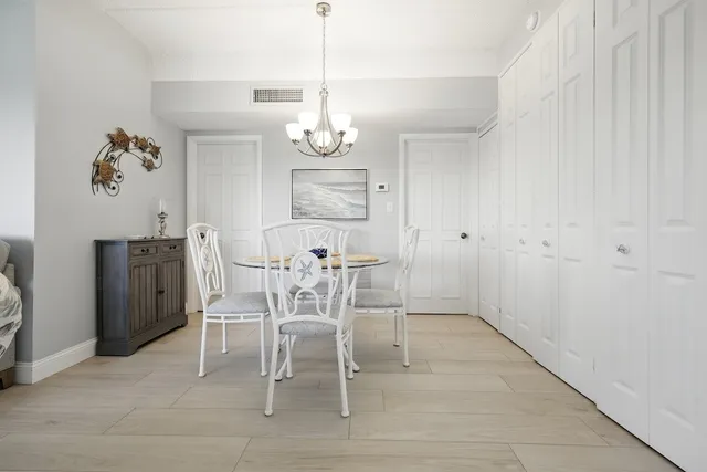 a view of a dining room with furniture
