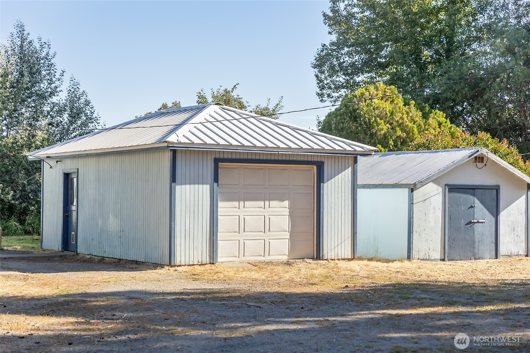 110 Strande Road Ellensburg, WA 98926 - Photo 4 of 39 a front view of a house with a yard and garage