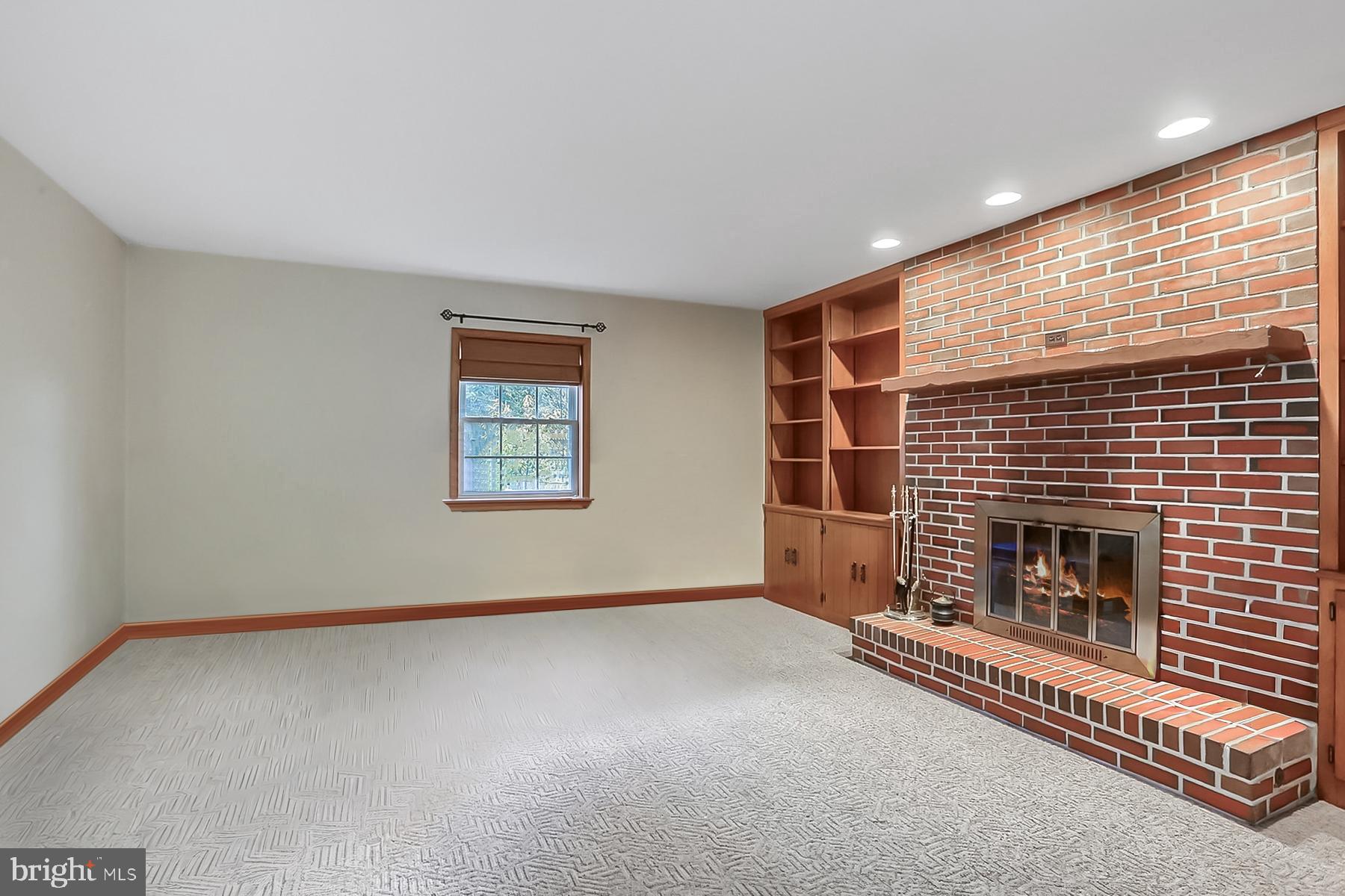 2011 Columbia Avenue Camp Hill, PA 17011 - Photo 12 of 33 a view of empty room with fireplace and window