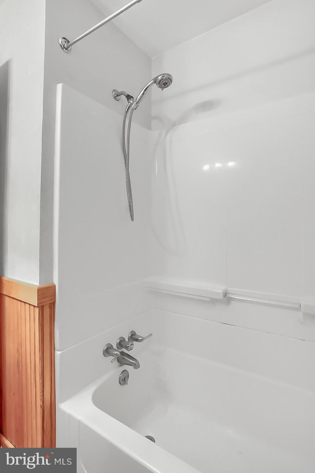 2011 Columbia Avenue Camp Hill, PA 17011 - Photo 17 of 33 a bathroom with a bathtub and a shower