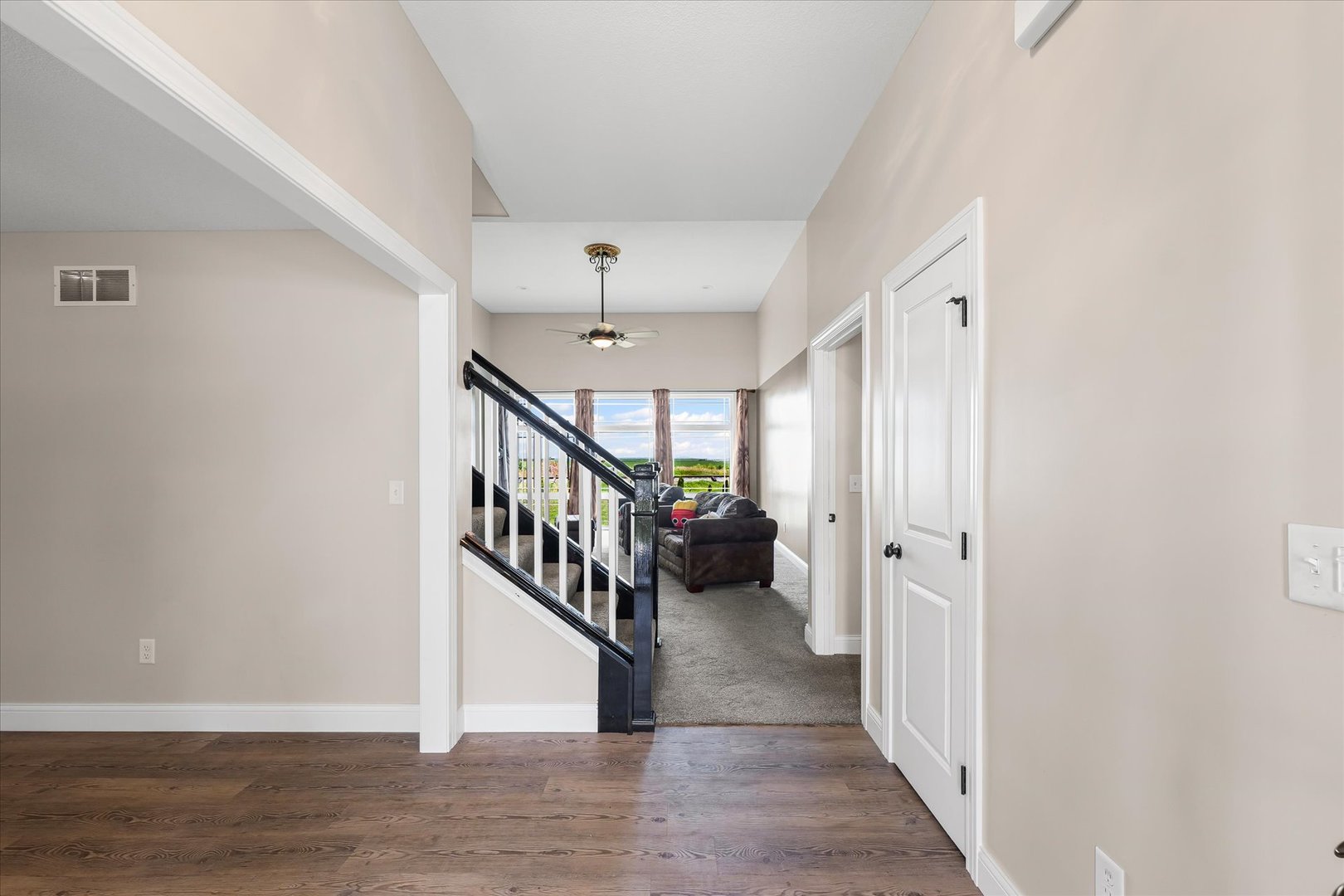 103 1st Street Strawn, IL 61775 - Photo 14 of 50 a view of an entryway with wooden floor and stairs