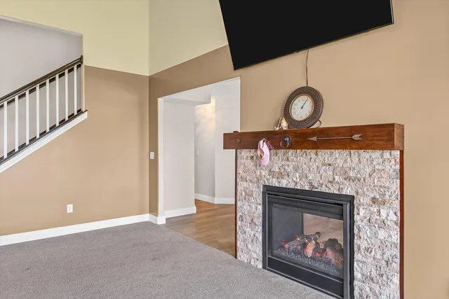 a view of a livingroom with a fireplace