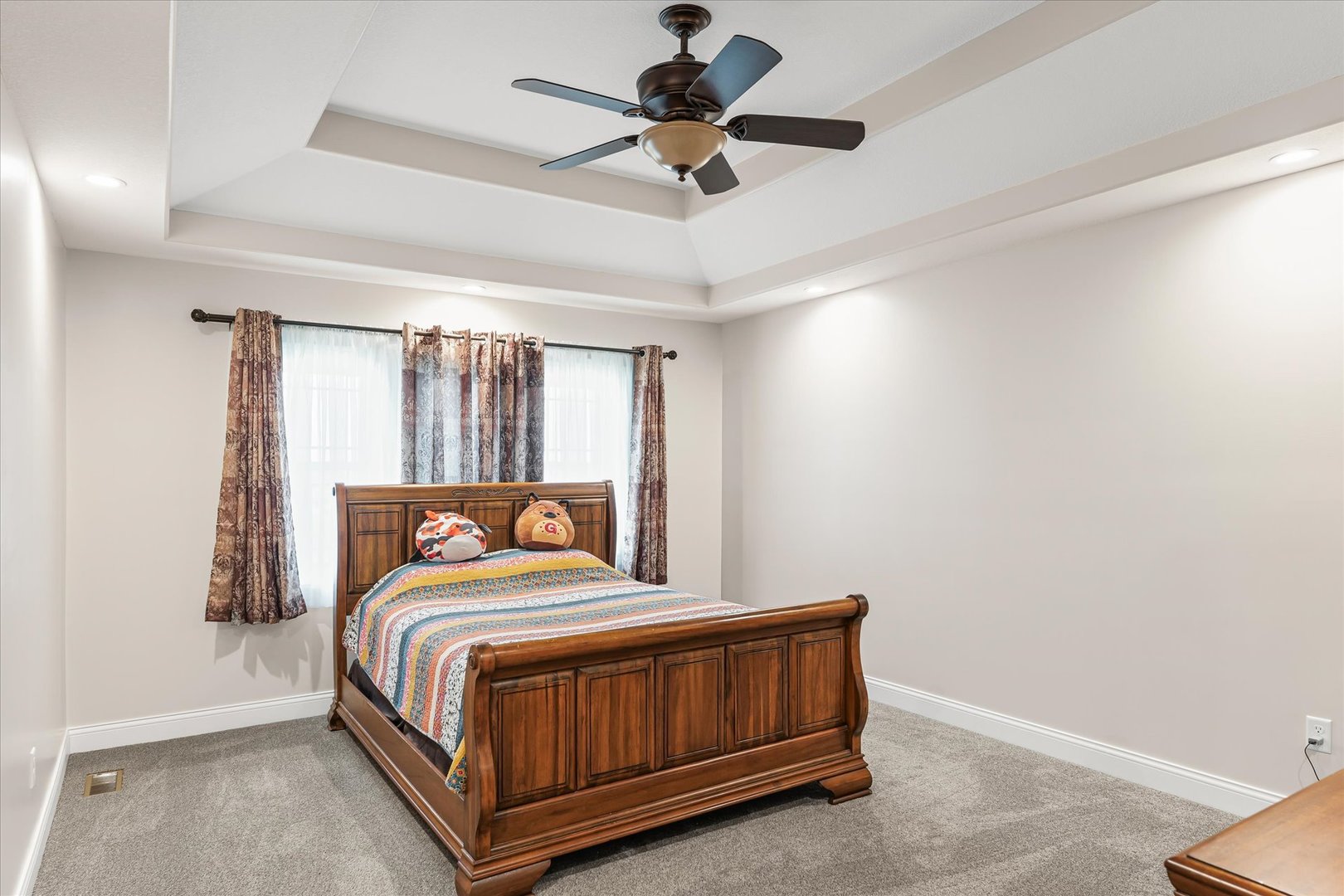 103 1st Street Strawn, IL 61775 - Photo 22 of 50 a bedroom with a bed and a ceiling fan