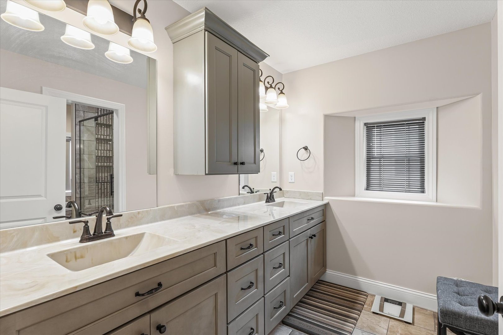 103 1st Street Strawn, IL 61775 - Photo 24 of 50 a bathroom with a sink double vanity granite and a mirror