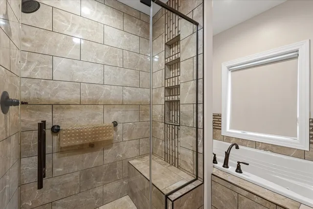 a bathroom with a shower and a sink