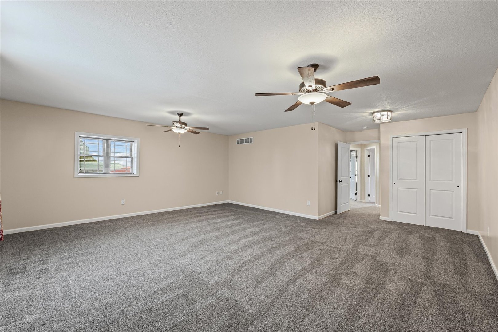 103 1st Street Strawn, IL 61775 - Photo 31 of 50 a view of an empty room with a ceiling fan