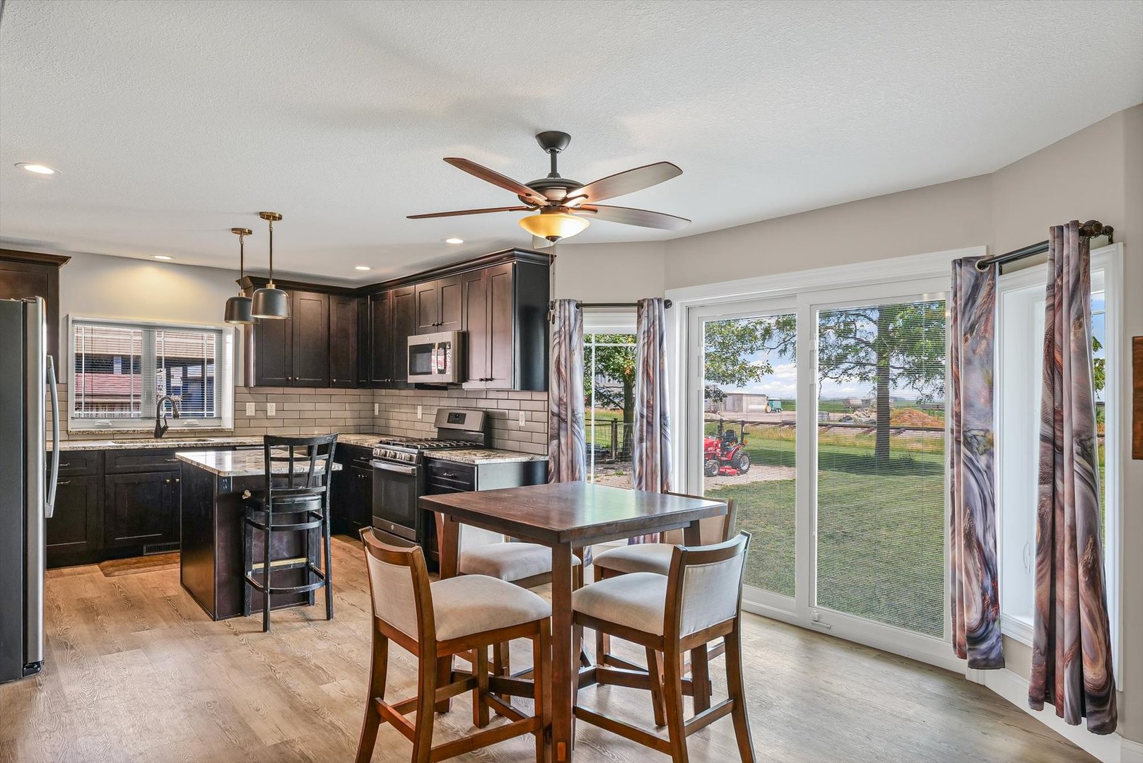 103 1st Street Strawn, IL 61775 - Photo 9 of 50 a view of a dining room with furniture window and wooden floor