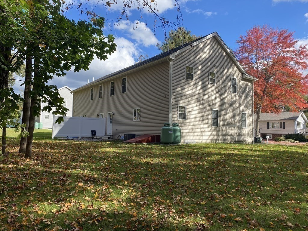 7 Marshall Street, Unit 7 Ayer, MA 01432 - Photo 20 of 31 a backyard of a house