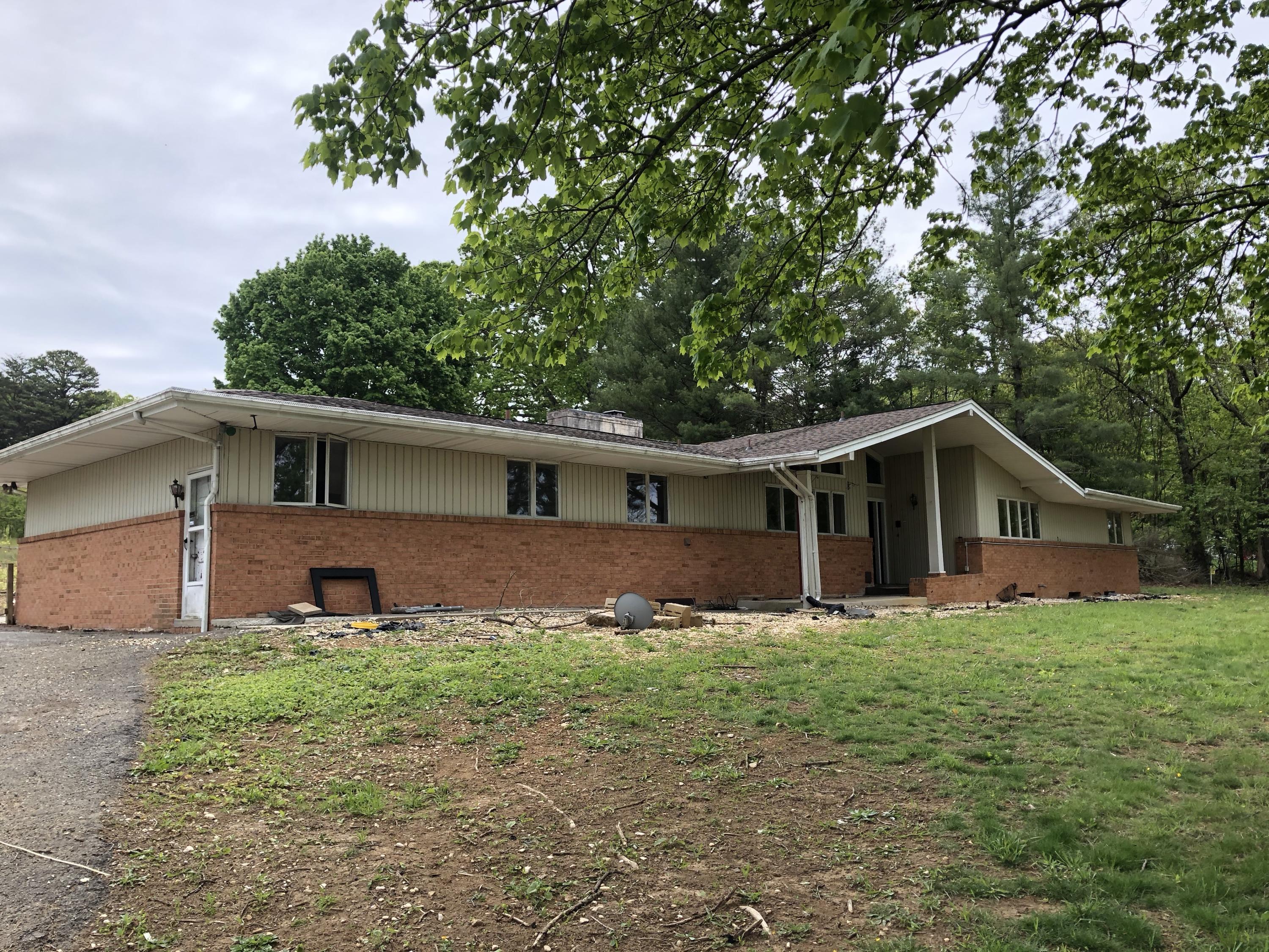 1764 Blue Ridge Springs Road Blue Ridge, VA 24064 - Photo 3 of 19 a front view of house with yard and trees