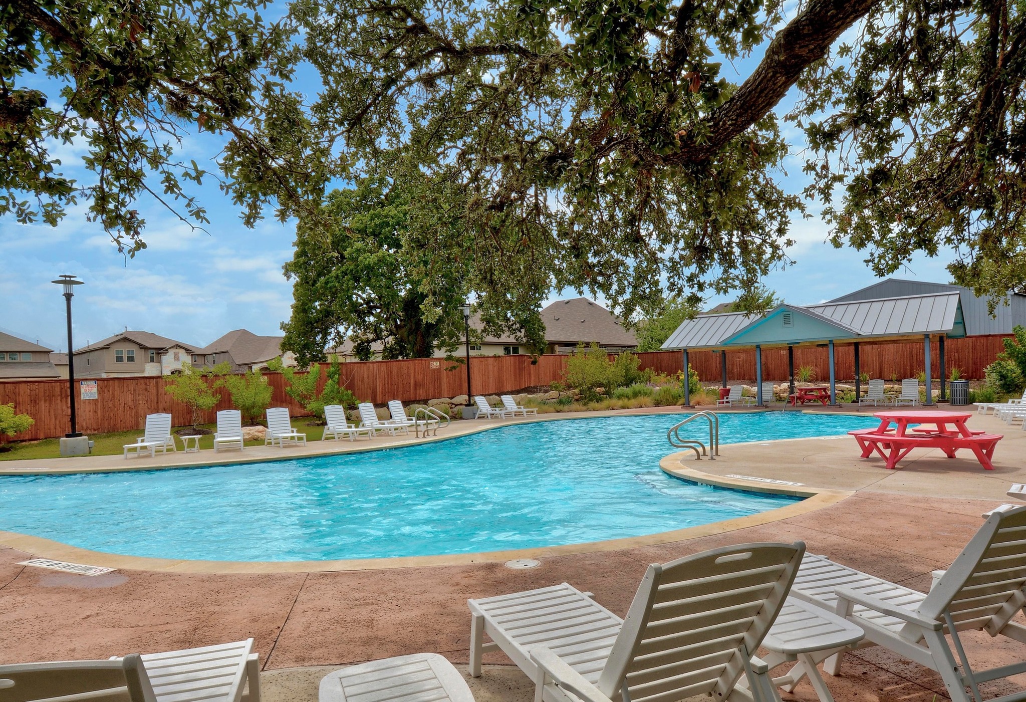 13009 Olivers Way Manchaca, TX 78652 - Photo 36 of 37 an outdoor view of a house with garden