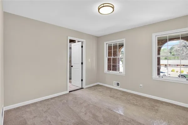 an empty room with windows