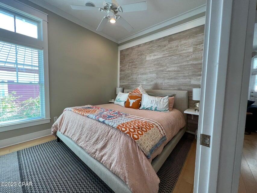 114 Parkshore Drive Panama City Beach, FL 32413 - Photo 24 of 86 a bedroom with a bed and window