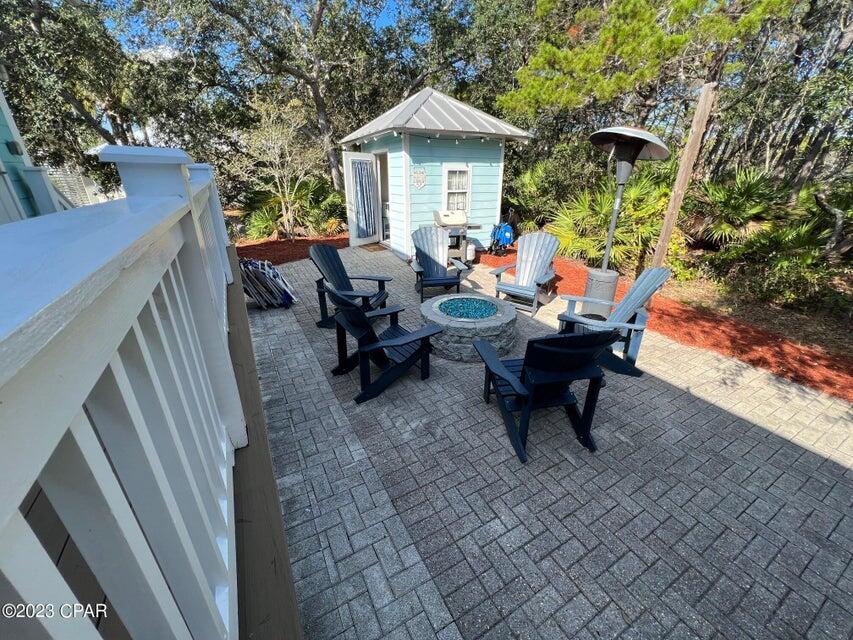 114 Parkshore Drive Panama City Beach, FL 32413 - Photo 40 of 86 a view of a house with backyard and sitting area