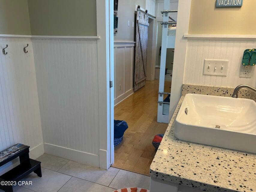 114 Parkshore Drive Panama City Beach, FL 32413 - Photo 63 of 86 a bathroom with a tub and a shower