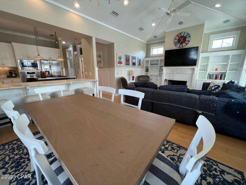 114 Parkshore Drive Panama City Beach, FL 32413 - Photo 78 of 86 a living room with furniture and a flat screen tv