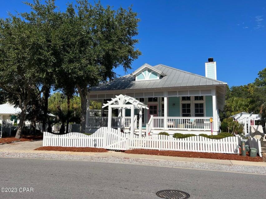 114 Parkshore Drive Panama City Beach, FL 32413 - Photo 81 of 86 a front view of a house with a small yard