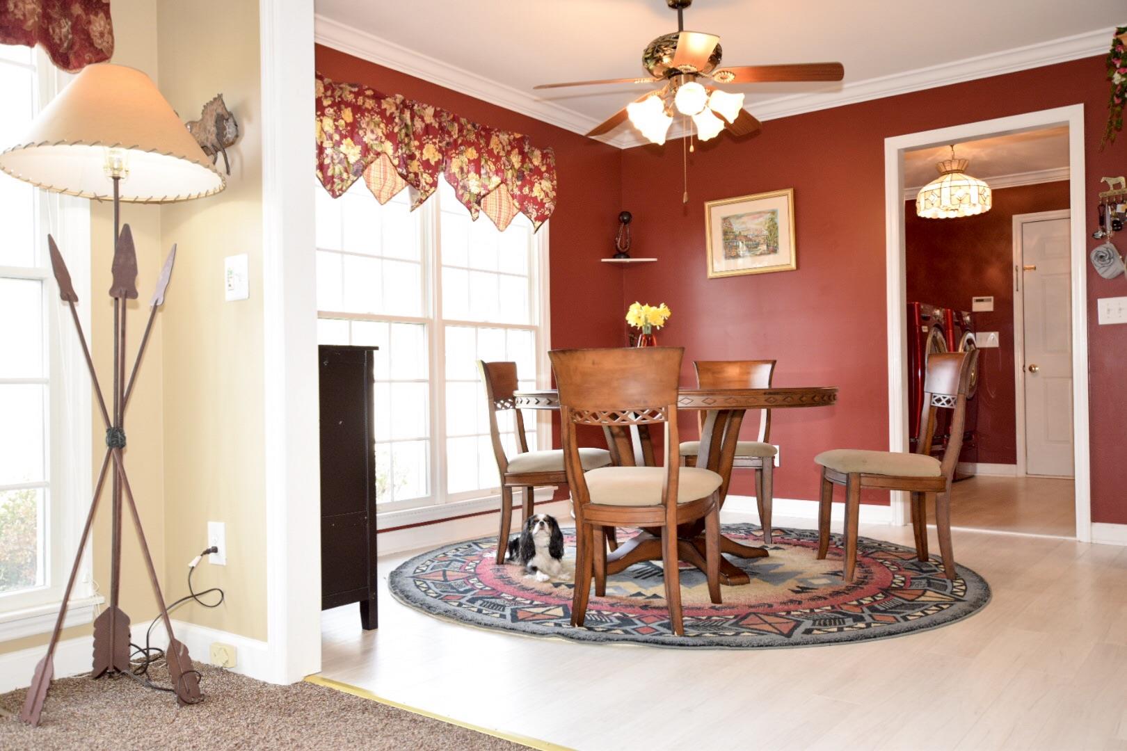 1000 Veto Road Prospect, TN 38477 - Photo 18 of 30 a dining room with chandelier and a rug