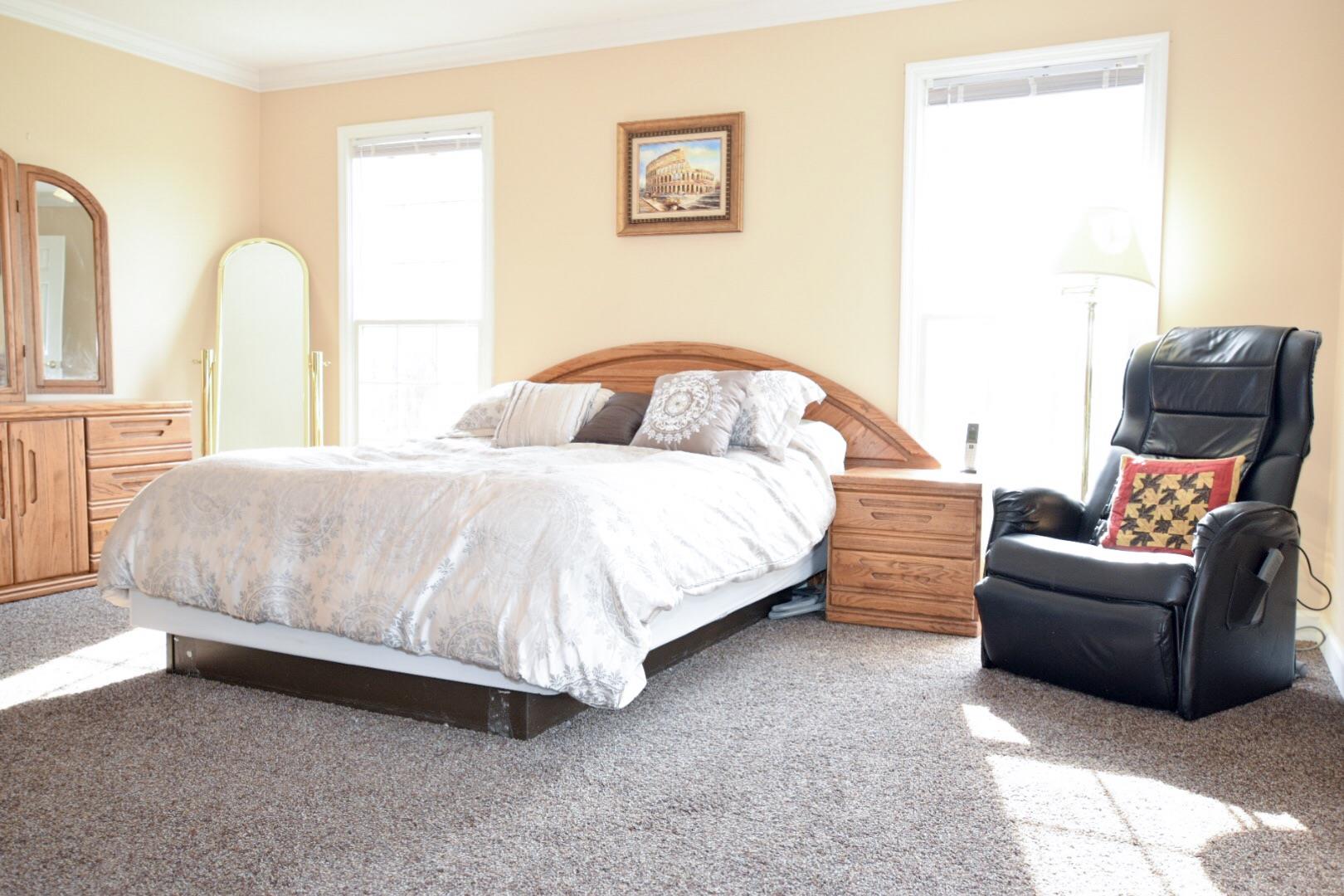 1000 Veto Road Prospect, TN 38477 - Photo 23 of 30 a bedroom with a bed couch and window