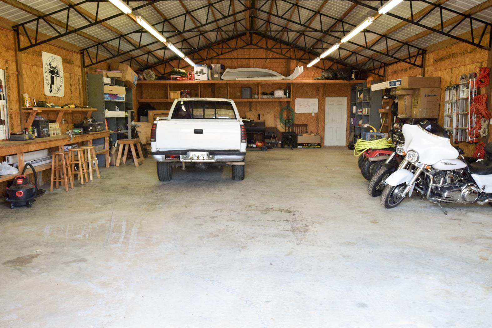 1000 Veto Road Prospect, TN 38477 - Photo 7 of 30 a view of garage with cars