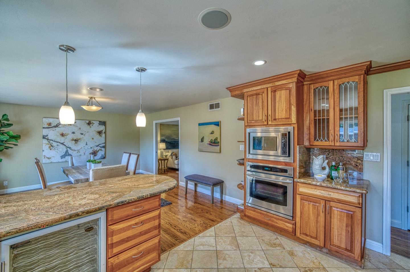 1174 Crandano Court Sunnyvale, CA 94087 - Photo 16 of 49 a kitchen with stainless steel appliances granite countertop a stove a sink and a refrigerator