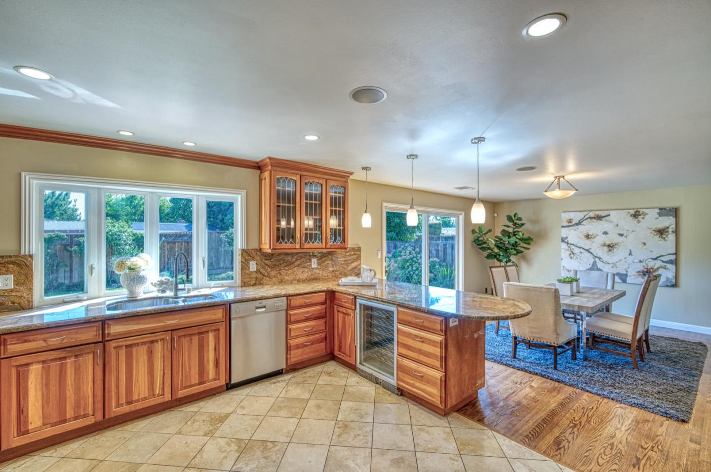 1174 Crandano Court Sunnyvale, CA 94087 - Photo 18 of 49 a large kitchen with lots of counter space and glass windows
