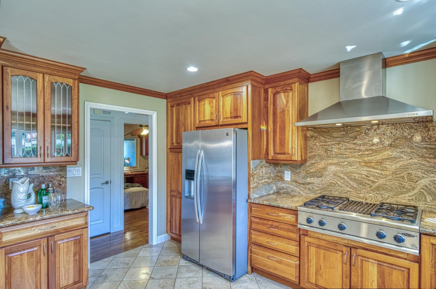1174 Crandano Court Sunnyvale, CA 94087 - Photo 19 of 49 a kitchen with stainless steel appliances granite countertop a refrigerator and a stove