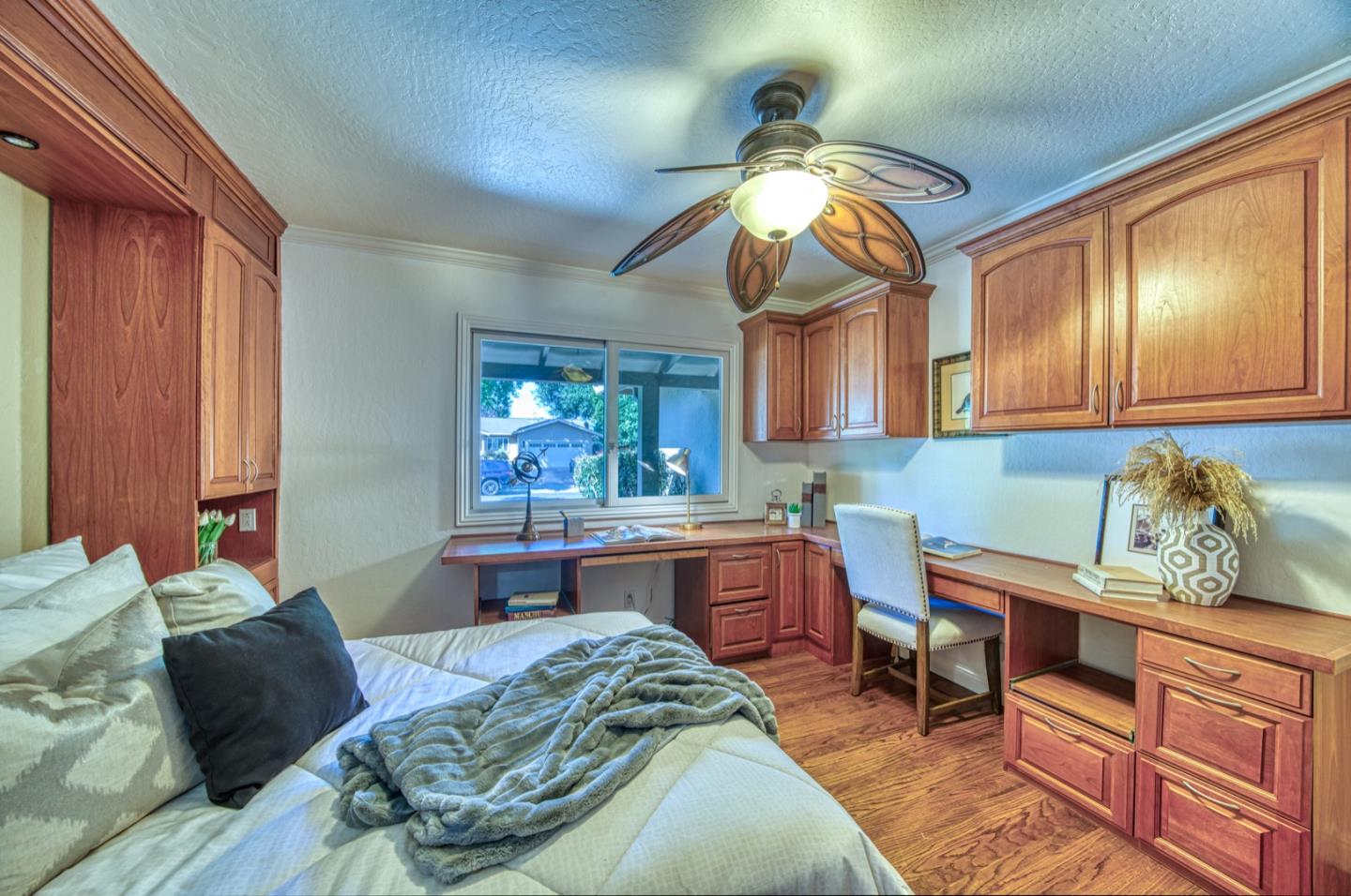 1174 Crandano Court Sunnyvale, CA 94087 - Photo 20 of 49 a living room with furniture a dining table and paintings on the wall
