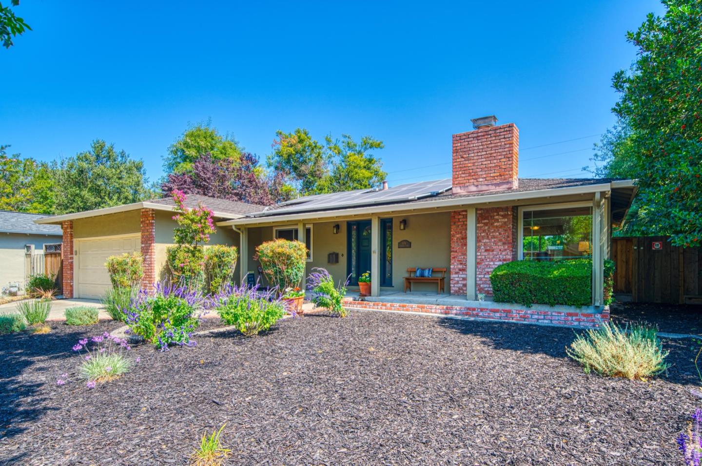 1174 Crandano Court Sunnyvale, CA 94087 - Photo 2 of 49 a front view of a house with garden