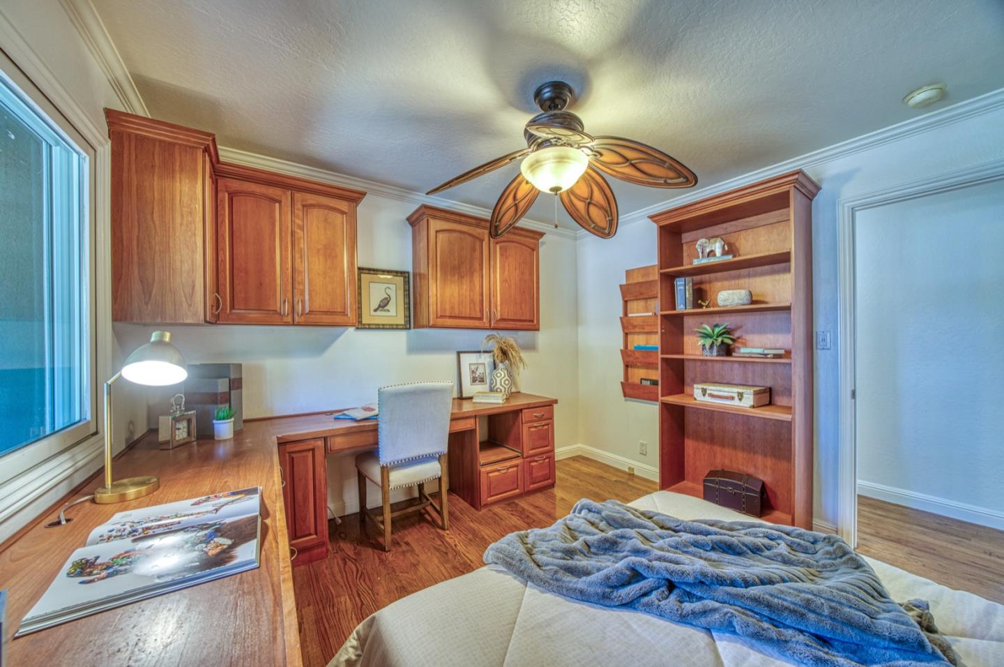 1174 Crandano Court Sunnyvale, CA 94087 - Photo 21 of 49 a bedroom with a bed and a chandelier