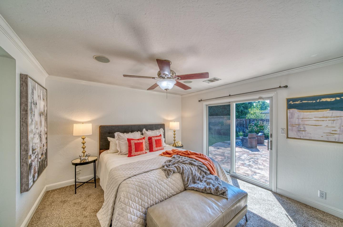 1174 Crandano Court Sunnyvale, CA 94087 - Photo 26 of 49 a bedroom with a large bed and a large window