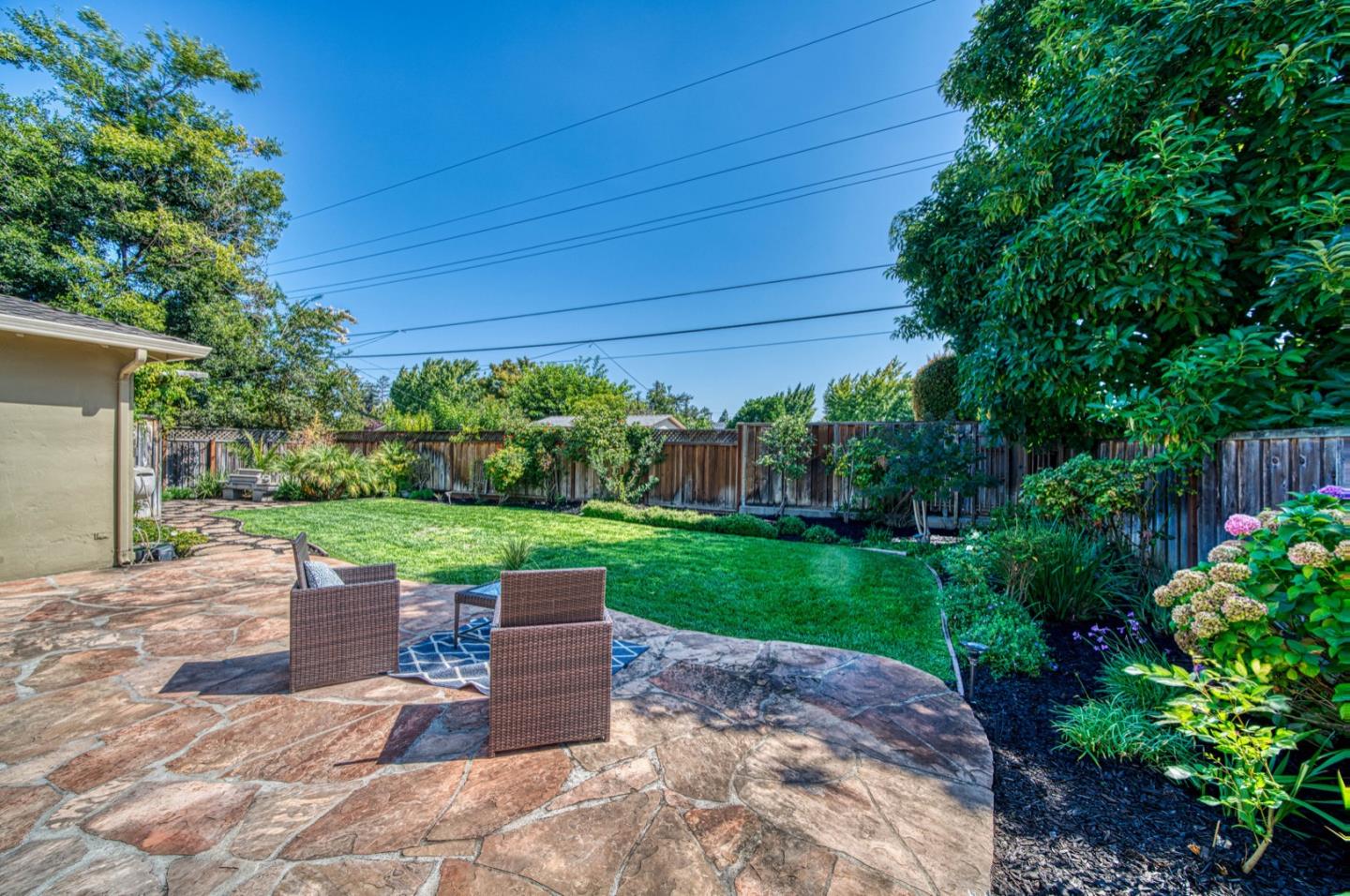 1174 Crandano Court Sunnyvale, CA 94087 - Photo 36 of 49 a view of a chair and table in the garden