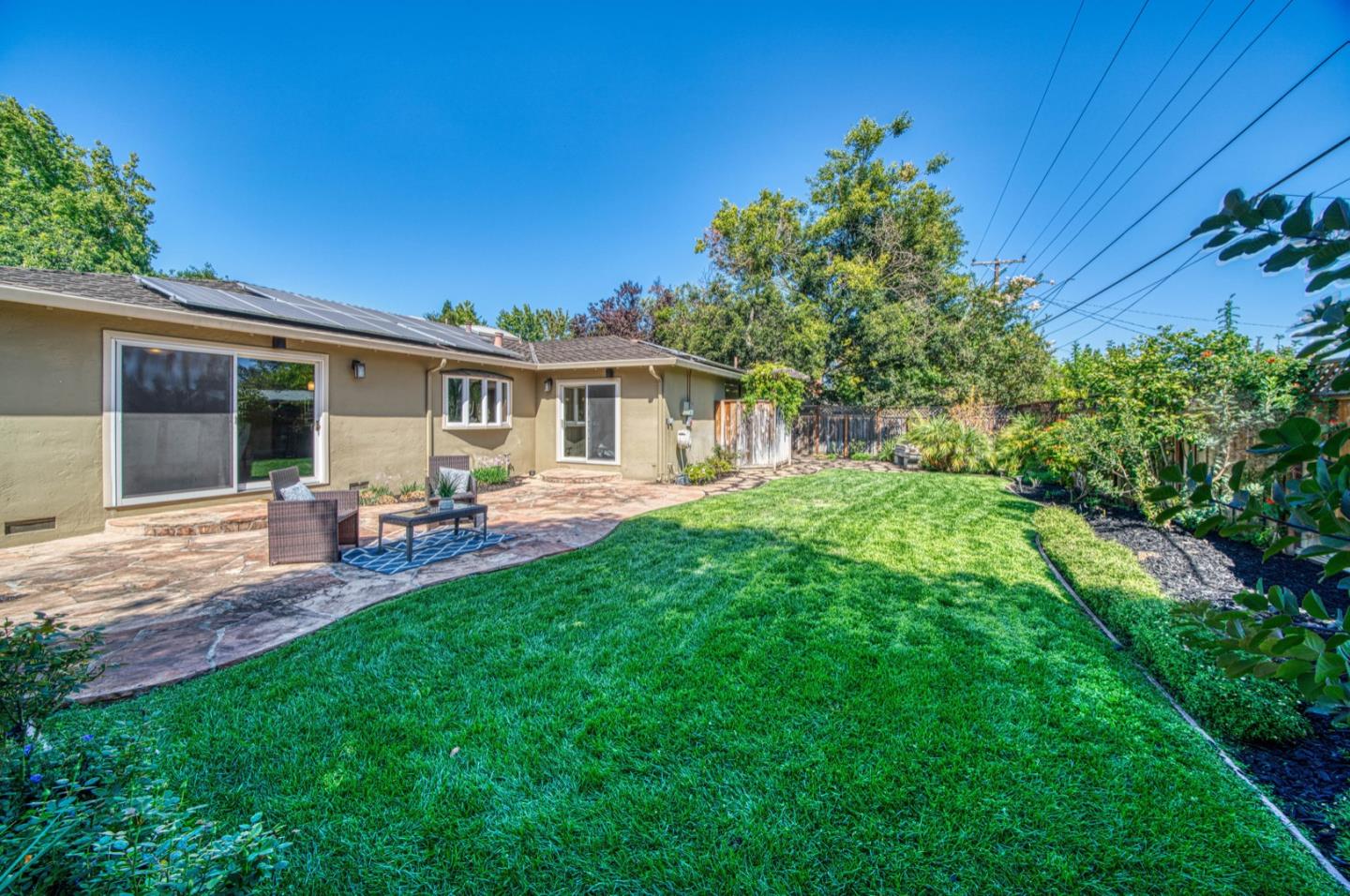 1174 Crandano Court Sunnyvale, CA 94087 - Photo 37 of 49 a view of a house with backyard porch and sitting area
