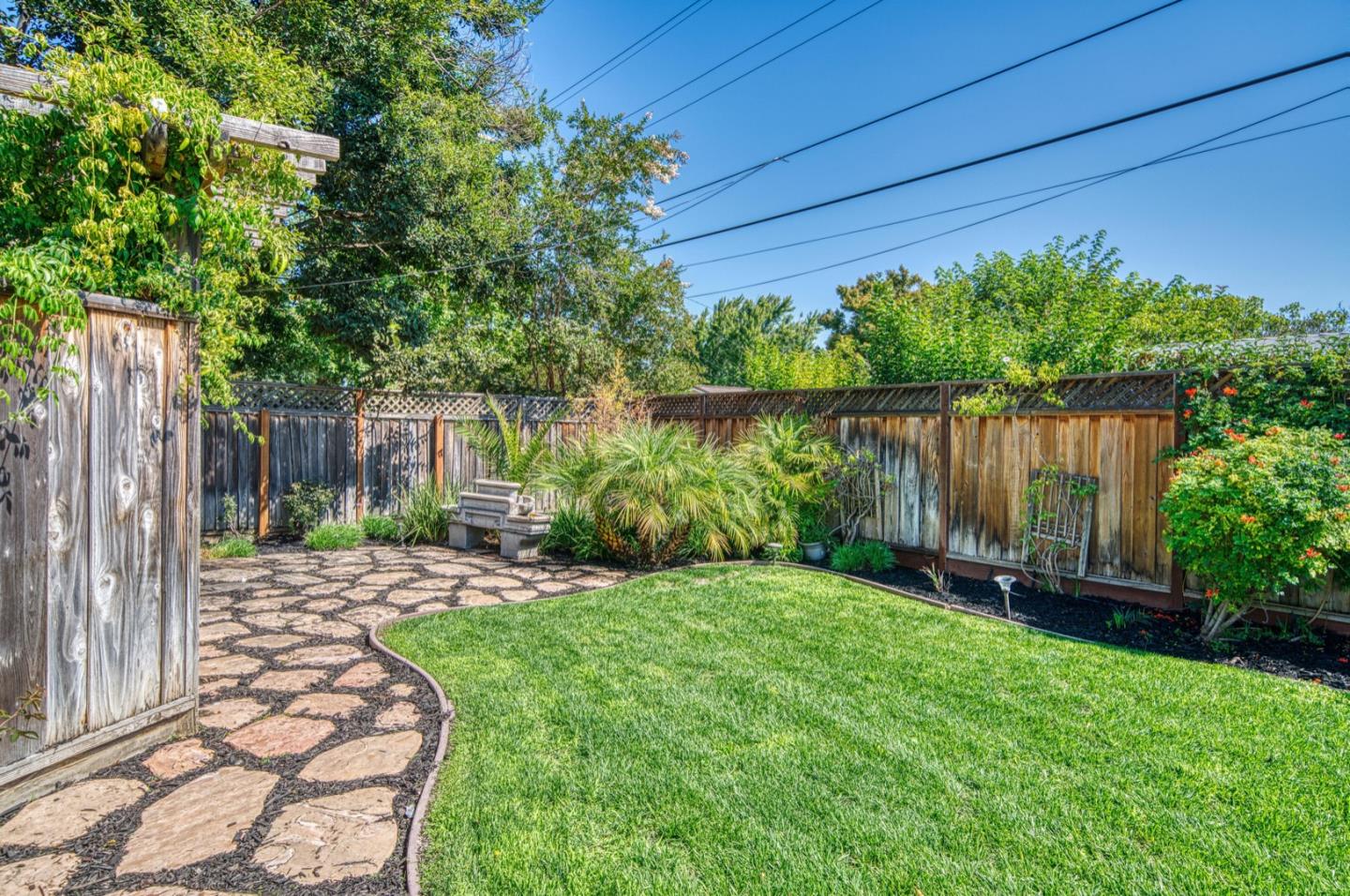 1174 Crandano Court Sunnyvale, CA 94087 - Photo 38 of 49 a view of a backyard with a garden