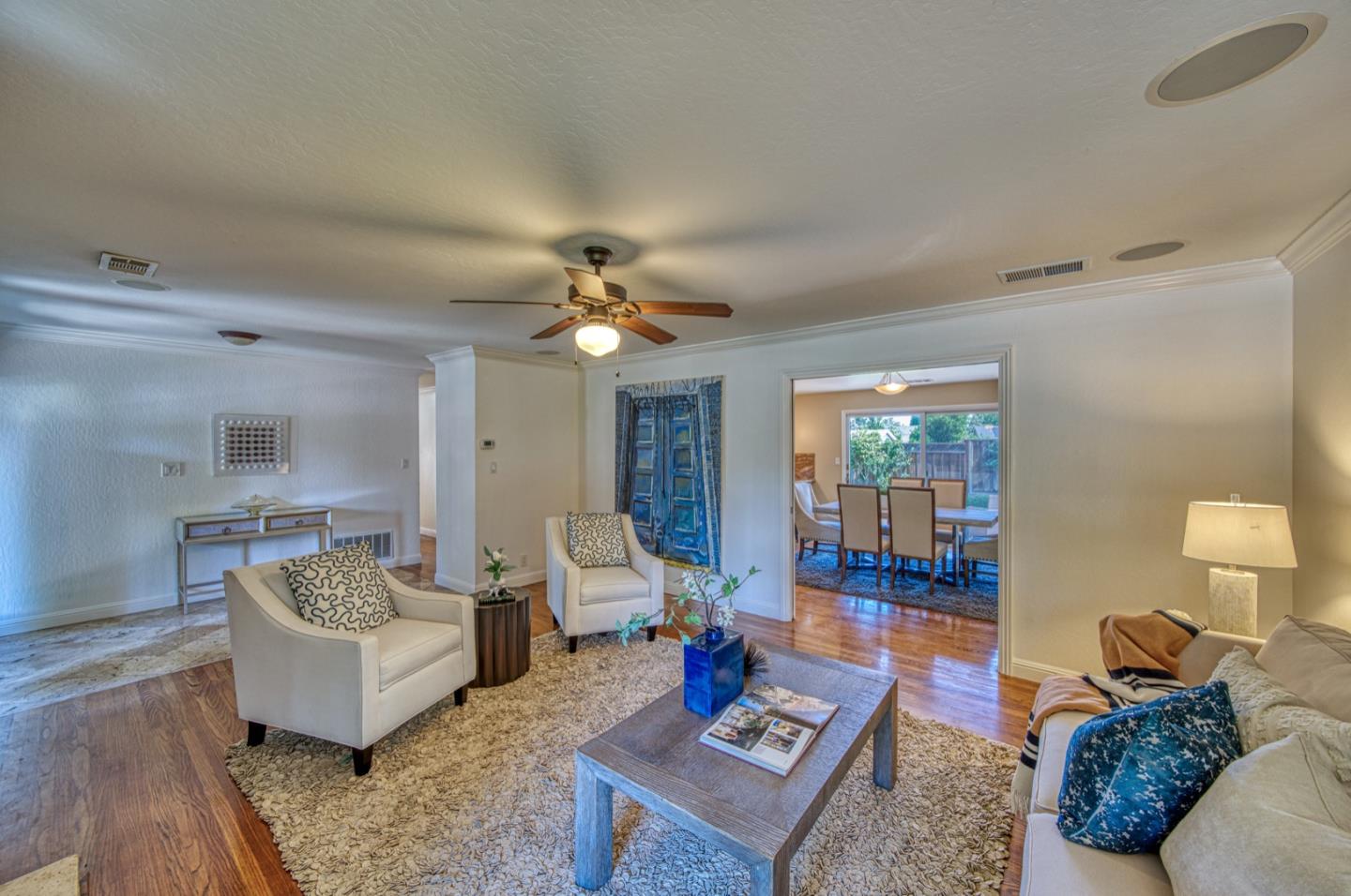 1174 Crandano Court Sunnyvale, CA 94087 - Photo 5 of 49 a living room with furniture and a rug