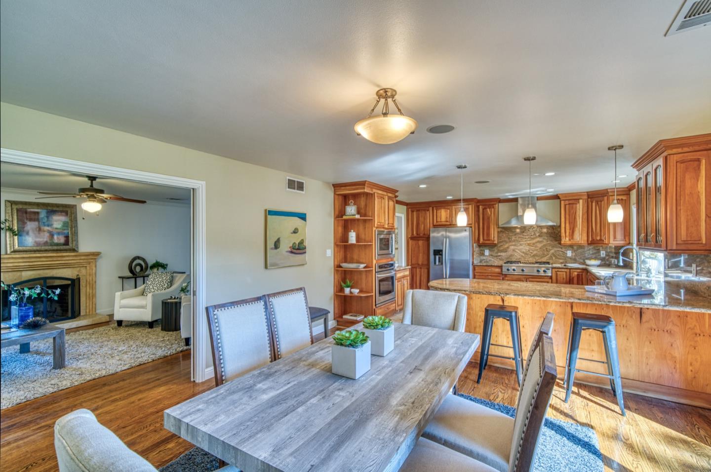 1174 Crandano Court Sunnyvale, CA 94087 - Photo 10 of 49 a living room with furniture and wooden floor