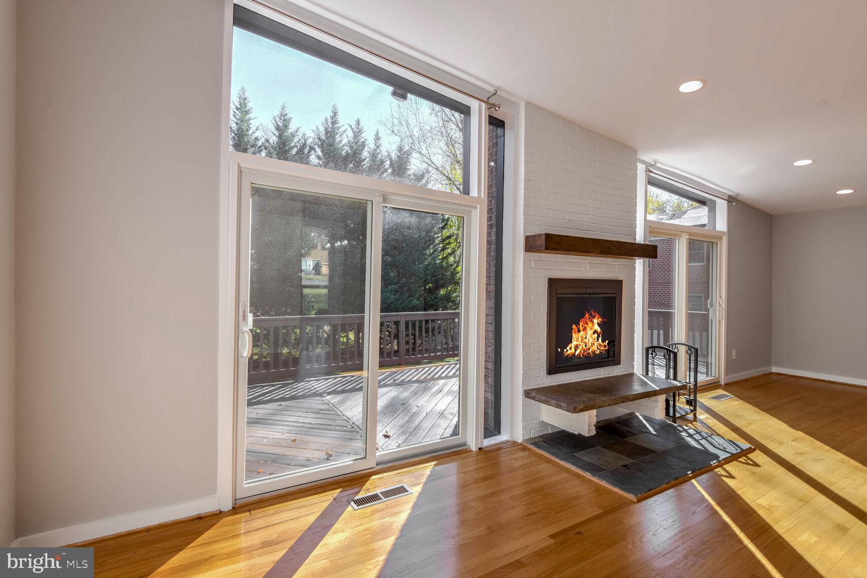 14645 Good Hope Road Silver Spring, MD 20905 - Photo 8 of 26 Bright living space with cozy fireplace.