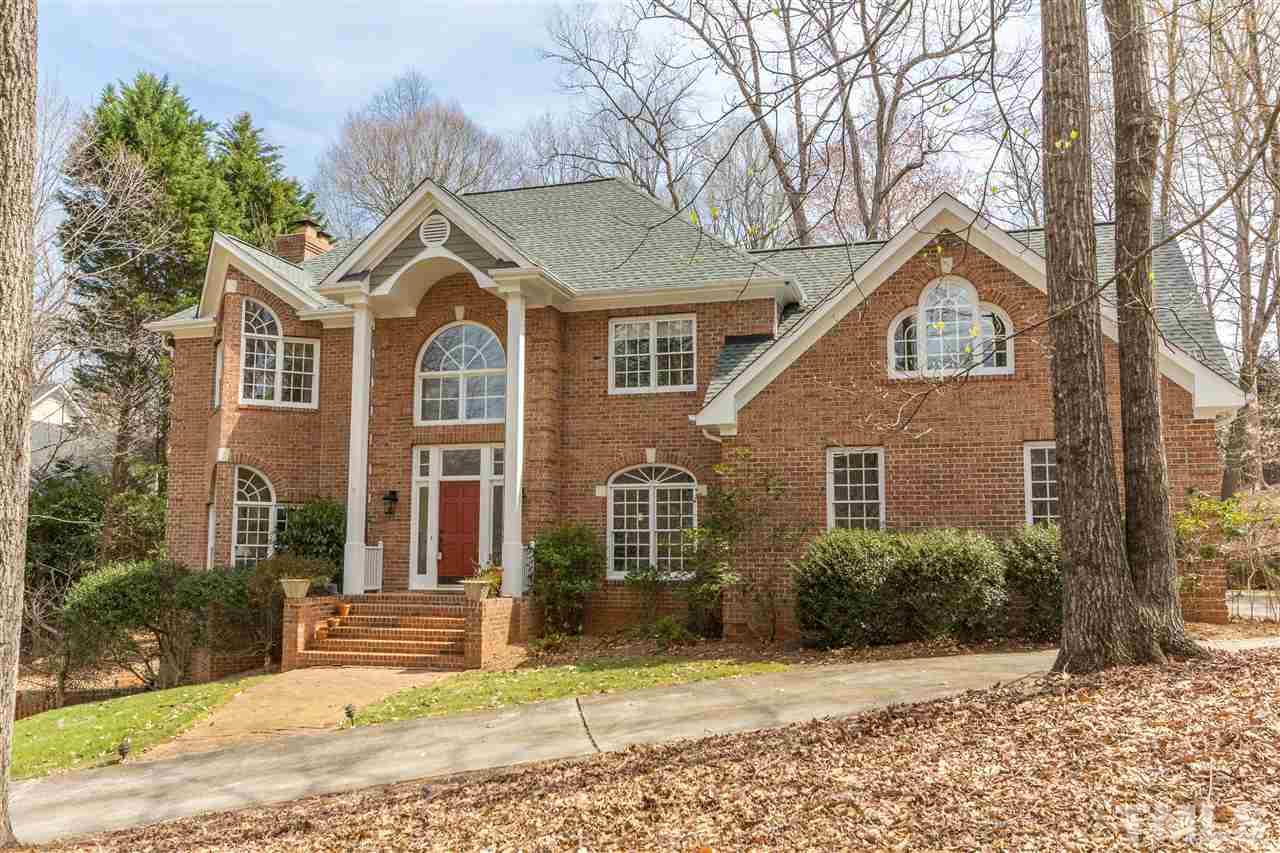 10616 Cahill Road Raleigh, NC 27614 - Photo 1 of 24 a front view of a house with a yard and potted plants