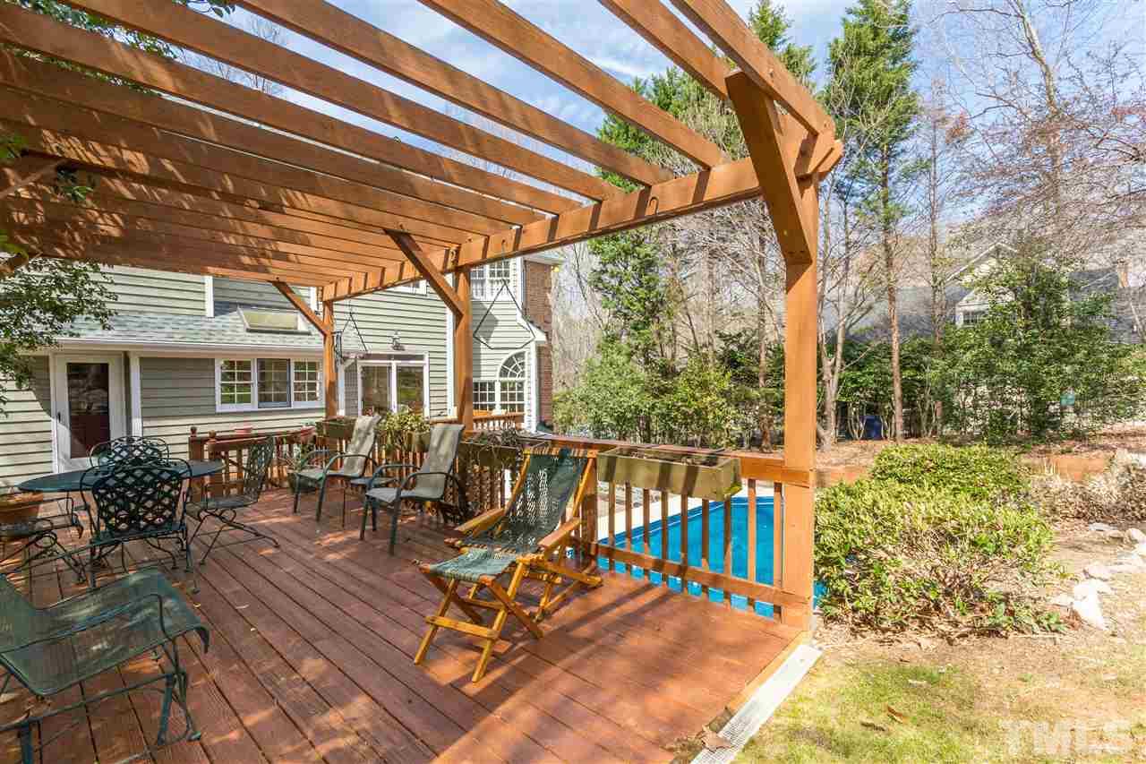 10616 Cahill Road Raleigh, NC 27614 - Photo 21 of 24 a view of a two chairs in the patio