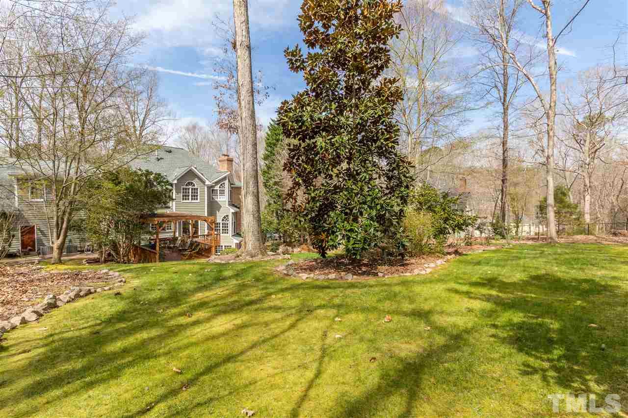 10616 Cahill Road Raleigh, NC 27614 - Photo 23 of 24 a view of a yard with a house