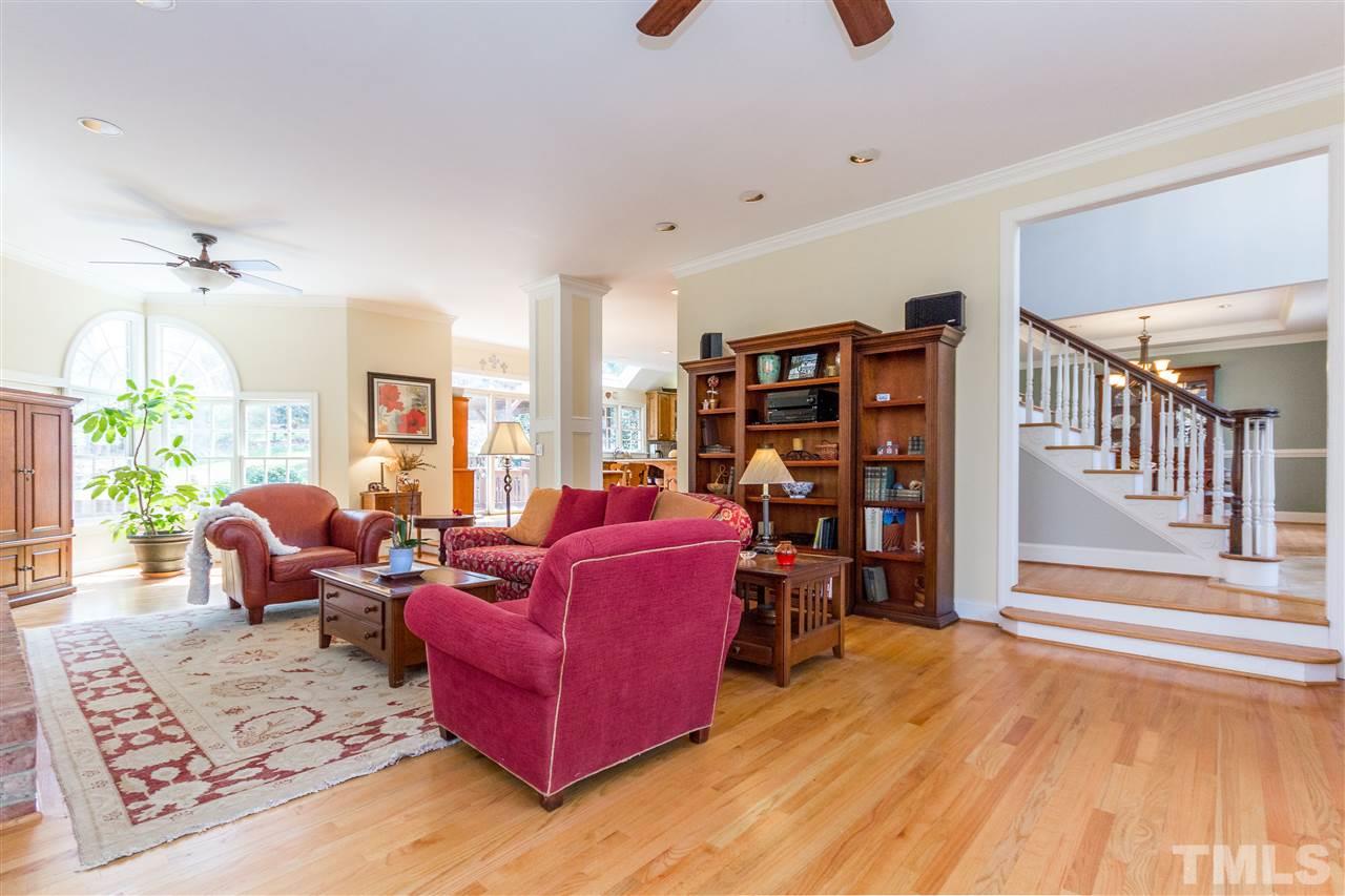 10616 Cahill Road Raleigh, NC 27614 - Photo 4 of 24 a living room with furniture and a wooden floor