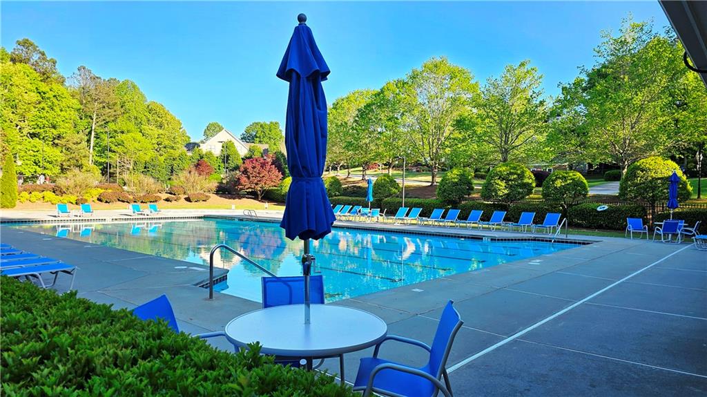 43 Ivy Mist Lane Acworth, GA 30101 - Photo 49 of 58 a view of a swimming pool with a patio