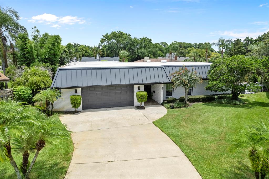 a view of backyard with green space