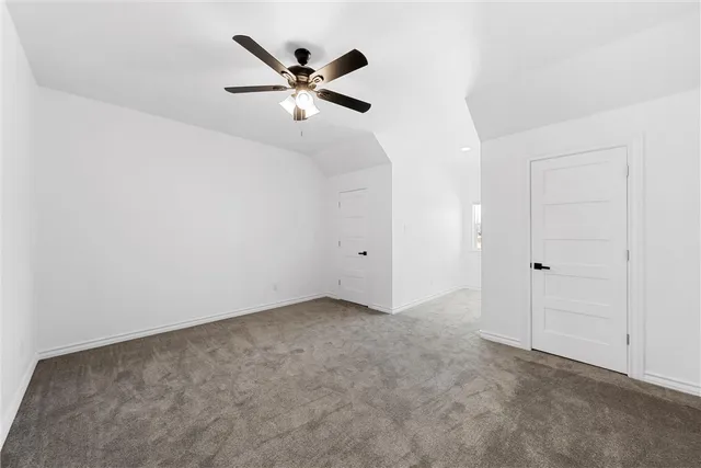 a view of kitchen and hall with wooden floor