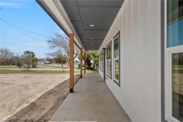 a house view with a garden space