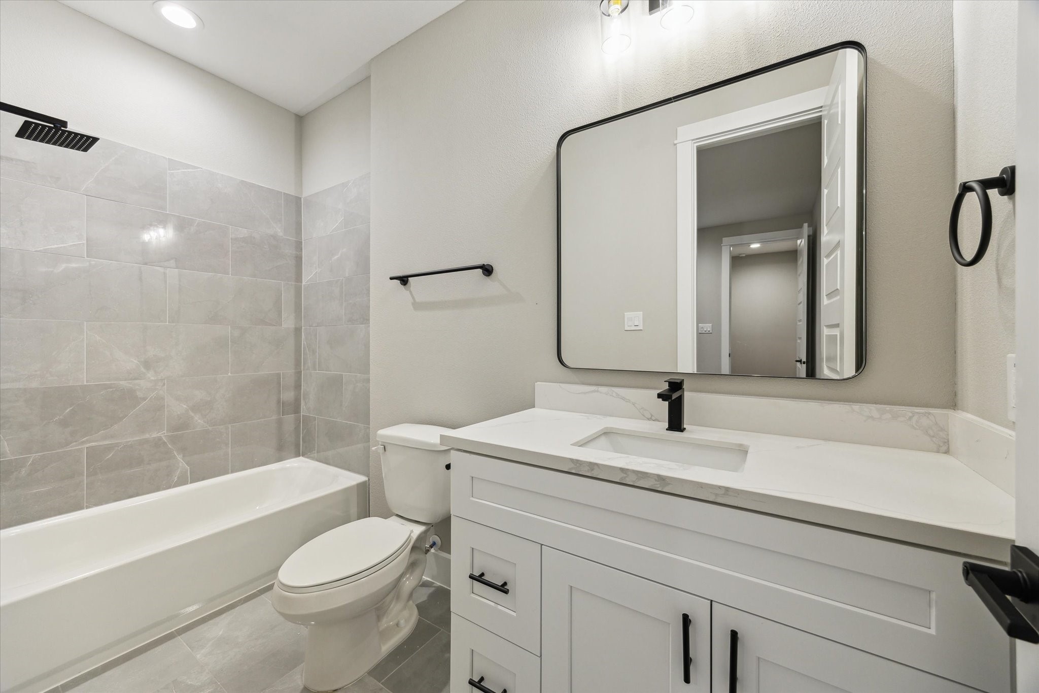 812 Thornton Road, Unit B Houston, TX 77018 - Photo 11 of 39 a bathroom with a sink toilet and shower