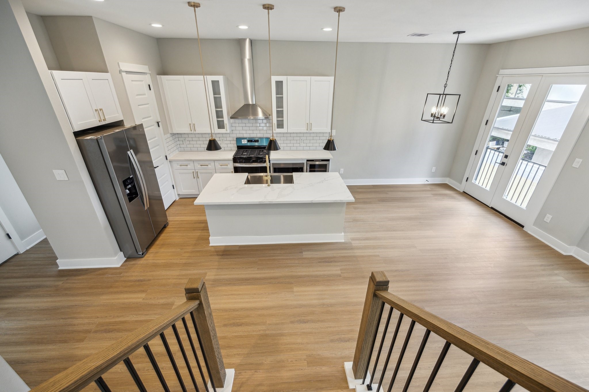812 Thornton Road, Unit B Houston, TX 77018 - Photo 13 of 39 a living room with stainless steel appliances furniture a fireplace and a flat screen tv