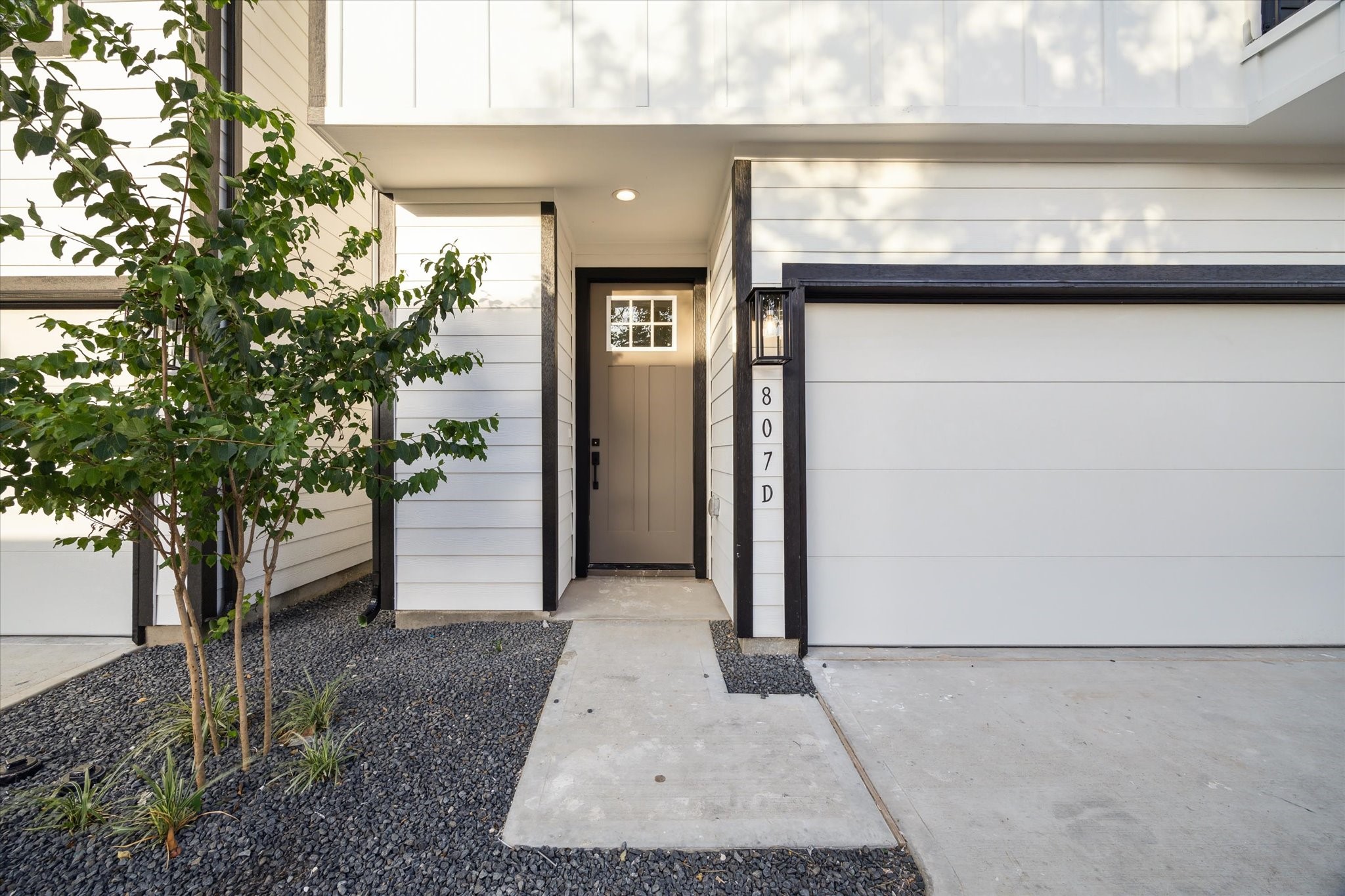 812 Thornton Road, Unit B Houston, TX 77018 - Photo 3 of 39 a view of a car garage with a small cabin